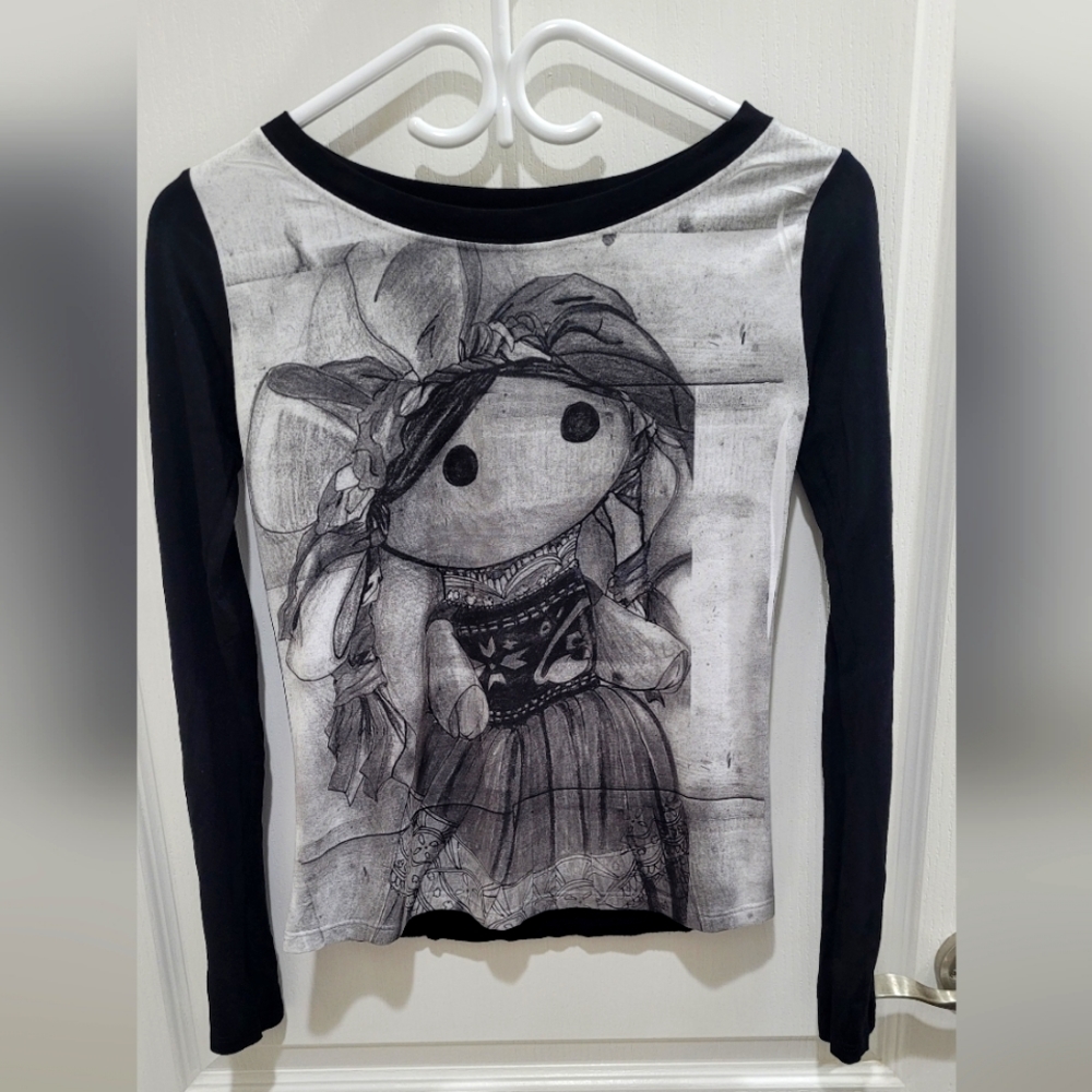 Black and white top with Mexica doll